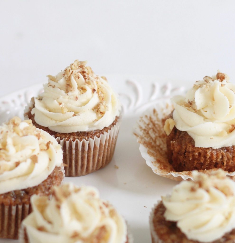 Carrot Cake Cupcakes Recipe with Homemade Buttercream Icing: Plan to double this recipe because your recipient are going to devour these carrot cake cupcakes! They're easy and fast to make and taste better than a bakery. The minced carrots give these cupcake incredible moisture that make them mouth-watering. Don't miss bringing these to your next event!