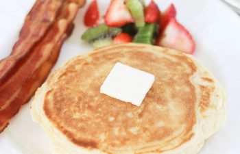 Pancakes from Scratch Recipe: You'll never make pancakes from a box again after trying this recipe. It's quick, easy, and requires ingredients you likely already have in your pantry. They're quick, easy, dense, slightly fluffy in the just the right way, and just the very best recipe.