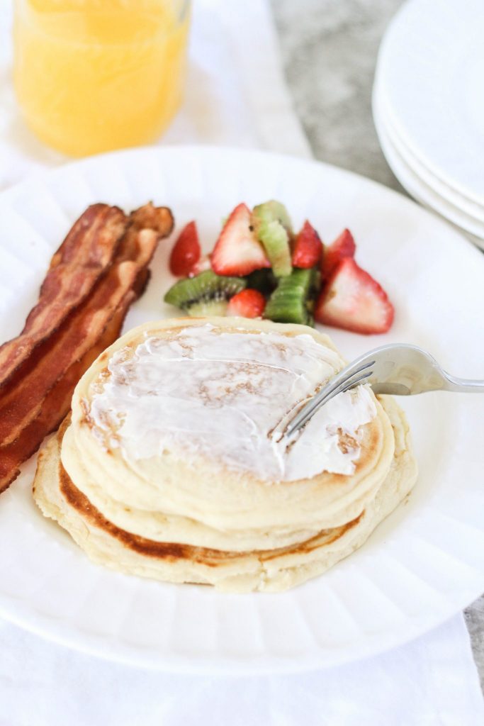 Pancakes from Scratch Recipe: You'll never make pancakes from a box again after trying this recipe. It's quick, easy, and requires ingredients you likely already have in your pantry. They're quick, easy, dense, slightly fluffy in the just the right way, and just the very best recipe. 