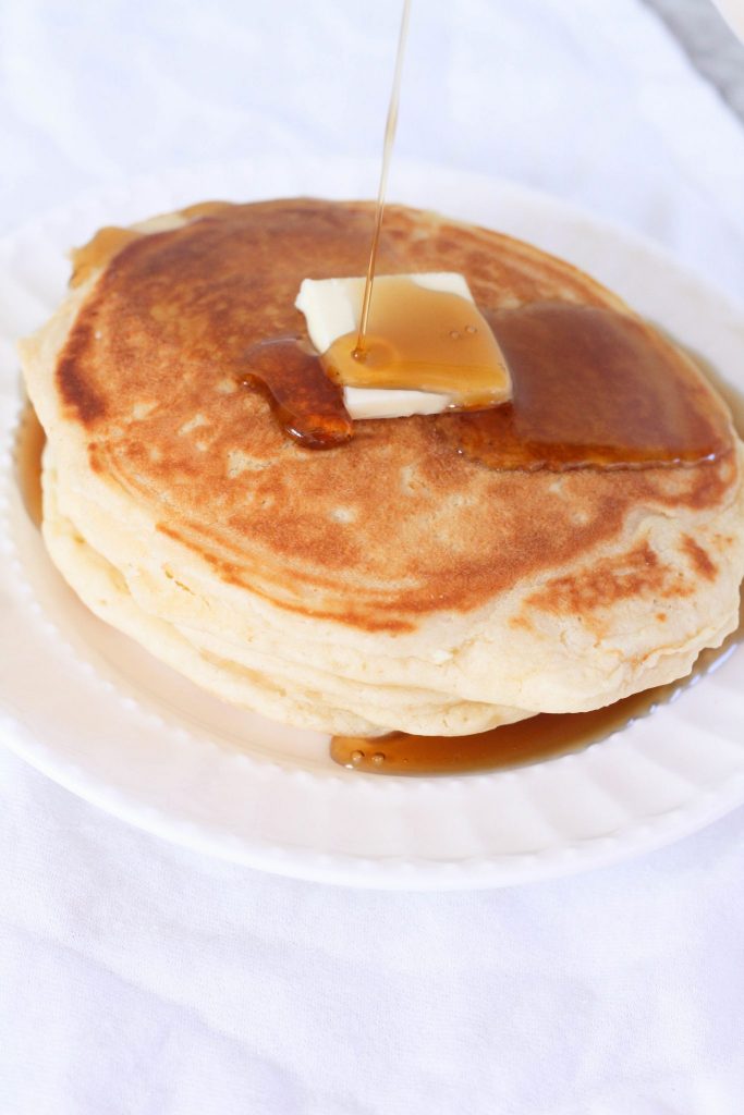 Pancakes from Scratch Recipe: You'll never make pancakes from a box again after trying this recipe. It's quick, easy, and requires ingredients you likely already have in your pantry. They're quick, easy, dense, slightly fluffy in the just the right way, and just the very best recipe. 