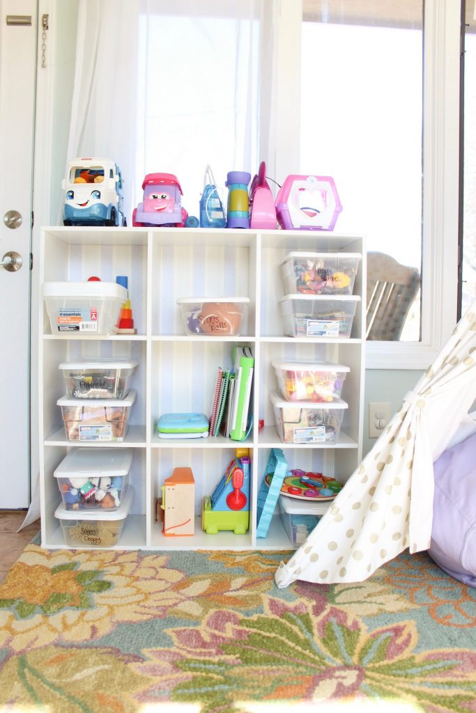Inexpensive toy organization and a simplified playroom: Click here to read about the steps and very minimal things needed to declutter and organize the toys in your house once and for all. Whether you have a playroom or not, these tips for quick organization will not only help you feel like you have some control over the clutter, but your kids will also play better with what they have (hint: it's because they'll have less!). Click here to read more. | Whimsical September