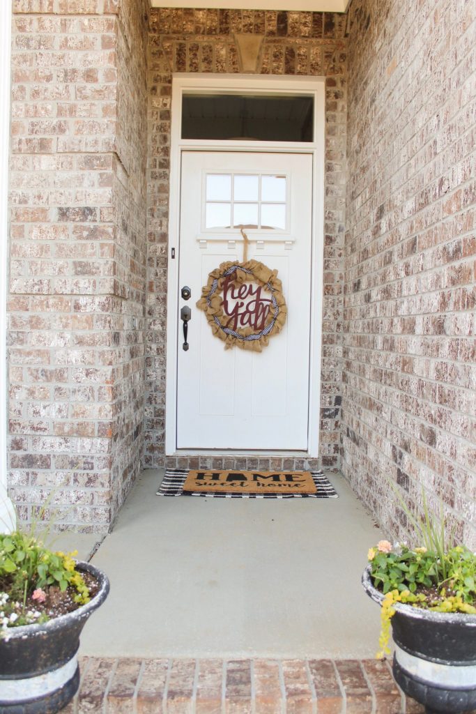 Styling our front porch: We knew we wanted our front porch to be bright and inviting, so we chose a color scheme and got to work! This combination of trendy + timeless styles makes this porch a Southern Living dream! Click here to read more.