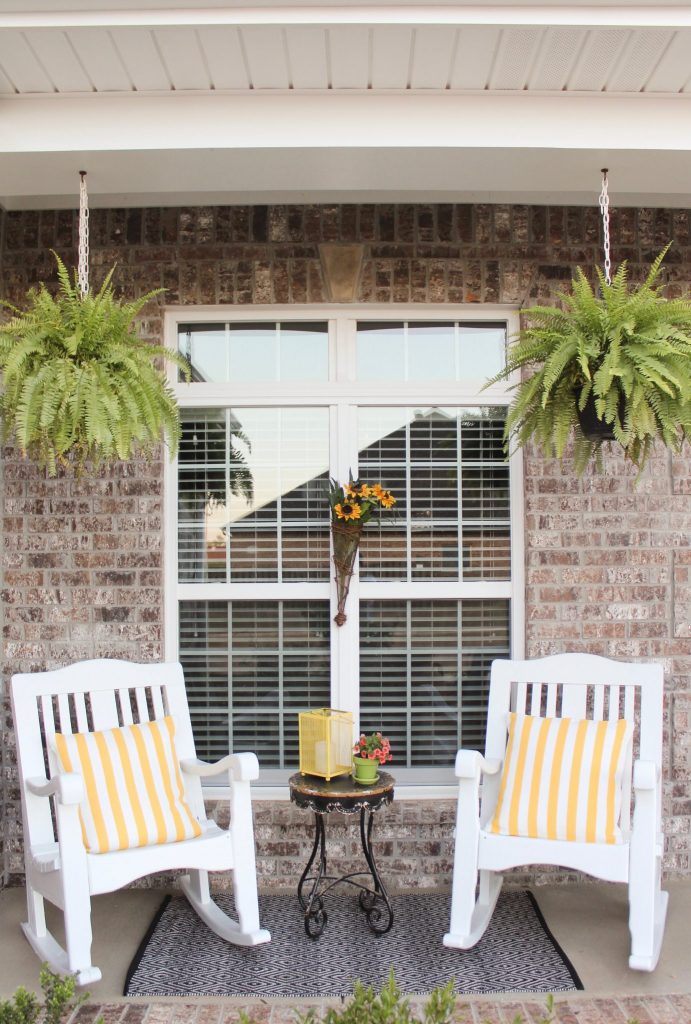 Styling our front porch: We knew we wanted our front porch to be bright and inviting, so we chose a color scheme and got to work! This combination of trendy + timeless styles makes this porch a Southern Living dream! Click here to read more.