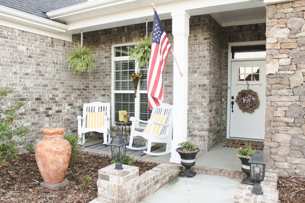 Styling a front porch: We knew we wanted our front porch to be bright and inviting, so we chose a color scheme and got to work! This combination of trendy + timeless styles makes this porch a Southern Living dream! Click here to read more.