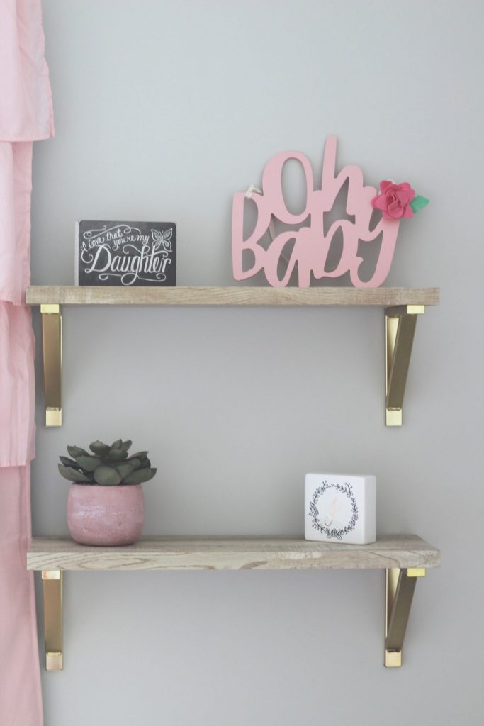 Pink and Gray Nursery Reveal: This post shares ideas, decorations, and resources for creating a baby girl's pink and gray nursery. Whether you are shooting for a rustic theme, shabby chic theme, or other theme, you're sure to find inspiration to create the look you want. You'll find curtains, wallpaper, wall decor, the crib, dresser, and more in this post. Enjoy! More on WhimsicalSeptember.com | Wallpaper from RockyMountainDecals.com