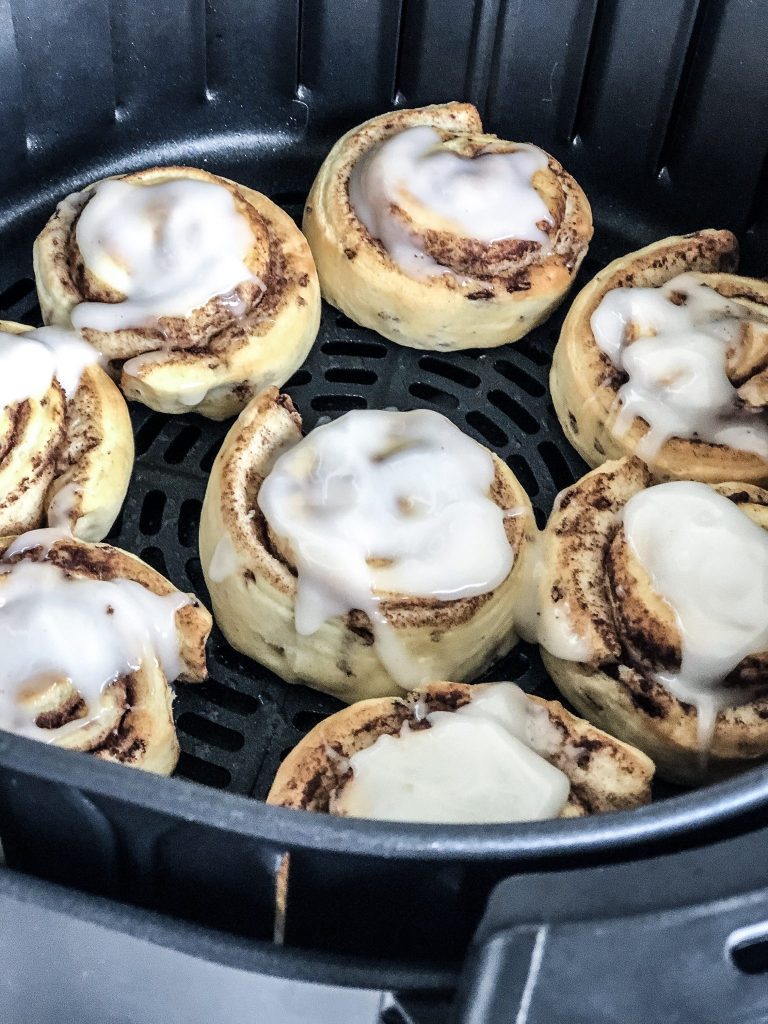 These air fryer cinnamon rolls bake in less than a quarter of the time it would take to bake them in the oven. This recipe/how-to post shares the temperature and amount of time it takes to bake up perfectly browned, semi-gooey store-bought cinnamon rolls. More on WhimsicalSeptember.com. We love our air fryer! | Whimsical September recipes