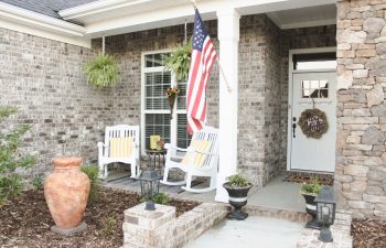 A new home always excitedly feels so much like a blank canvas just waiting for some color and personality, and our front porch was the first canvas that I couldn't wait to "paint".